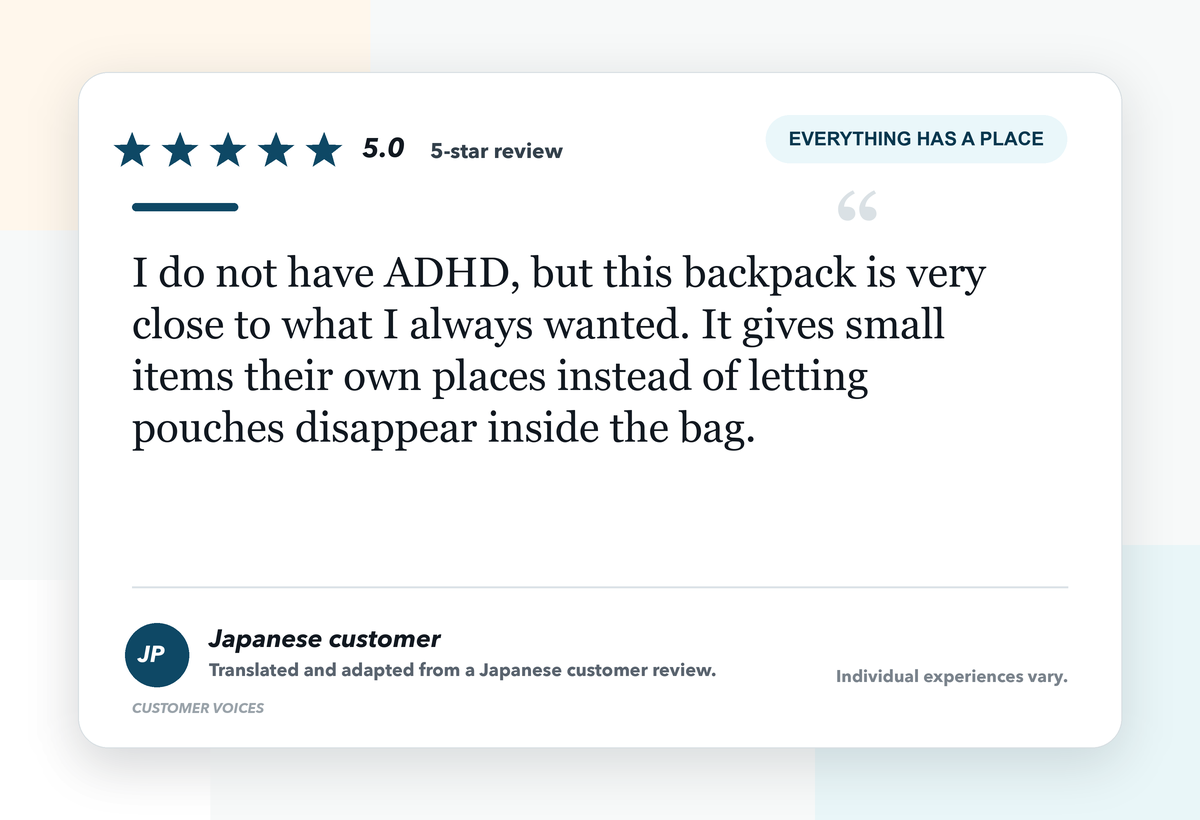Five-star Japanese customer review about KABAG giving small items their own places inside the bag.